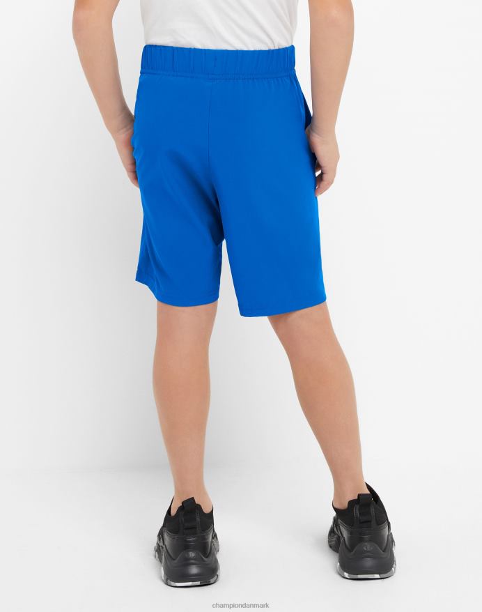 Champion store børns vævede drengeshorts fugttransporterende reflekterende c-logo 7 V6J661878 bor i blåt