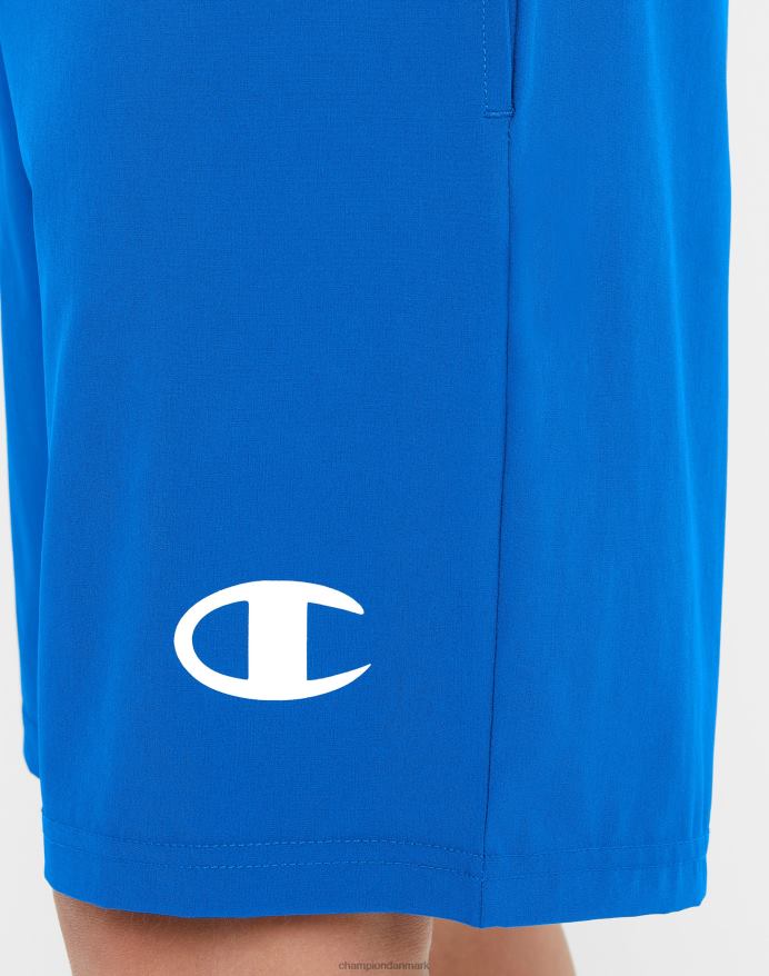 Champion store børns vævede drengeshorts fugttransporterende reflekterende c-logo 7 V6J661878 bor i blåt