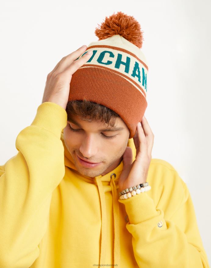 hue med manchet og pom blok champion V6J66893 kridhvid/texas orange
