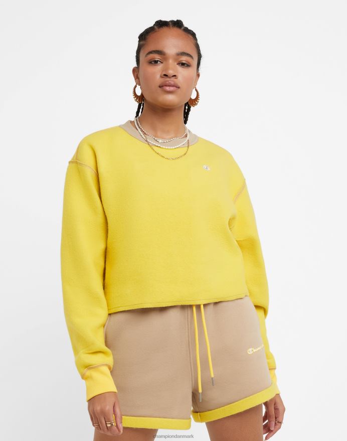 Champion klassisk fleece crew vendbart c-logo V6J661034 land valnød/gul sten