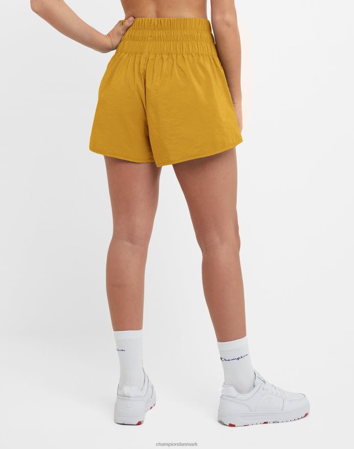 Champion vævede shorts c patch logo 2.5 V6J661418 solskive gul