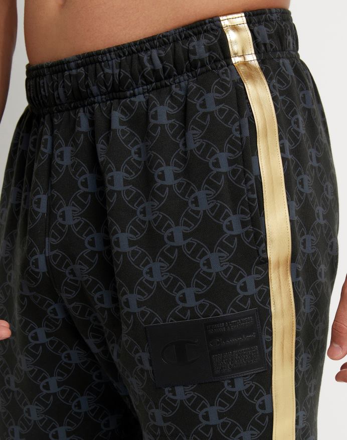 Champion klassiske fleece joggers all-over print med jock tag i imiteret læder 31 V6J66255 c logo links aop sort