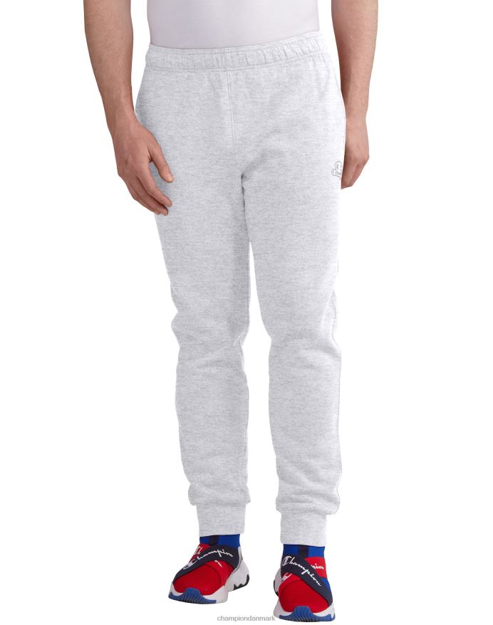 Champion klassiske fleece joggers c logo og script patch 31 V6J66326 bleget stencremelyng