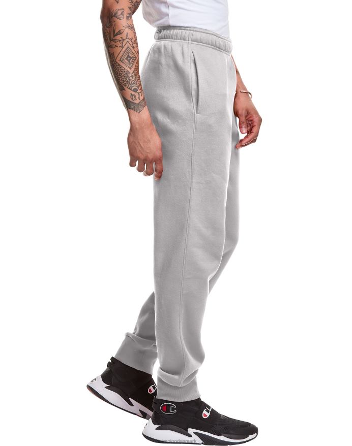 Champion klassiske fleece joggers c logo og script patch 31 V6J66326 bleget stencremelyng