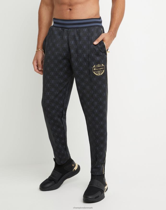 champion allover print joggebukser guld lurex logo medaljon V6J66283 c logo aop sort