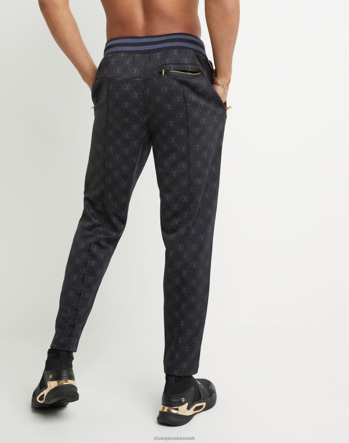 champion allover print joggebukser guld lurex logo medaljon V6J66283 c logo aop sort