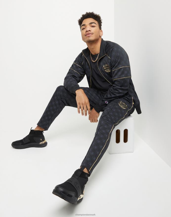 champion allover print joggebukser guld lurex logo medaljon V6J66283 c logo aop sort