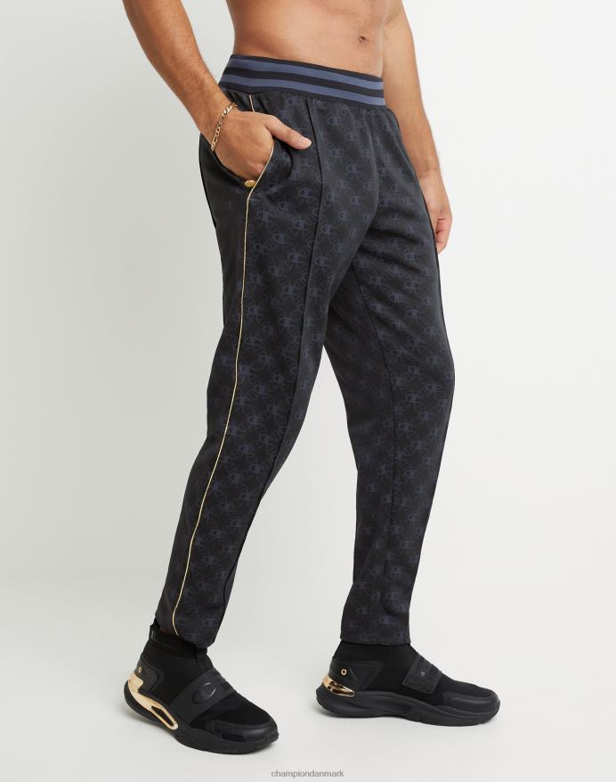 champion allover print joggebukser guld lurex logo medaljon V6J66283 c logo aop sort