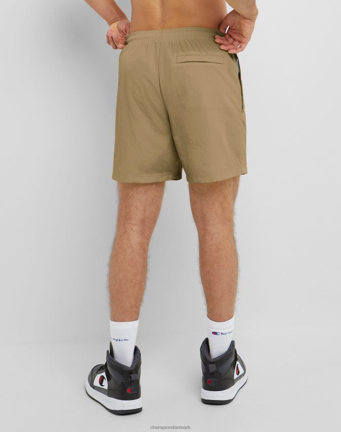 Champion nylon opvarmningsshorts med mesh-foring script-logo 6 V6J66419 fuld hvede khaki